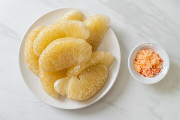 Fresh peeled pomelo, grapefruit or shaddock