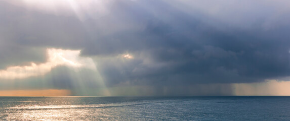 cloud of storm, pouring rain in sea, deep blue cloud speel rain water in ocean , cyclone weathre con