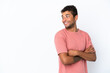 © luismolinero - Young handsome Brazilian man isolated on white background looking to the side and smiling