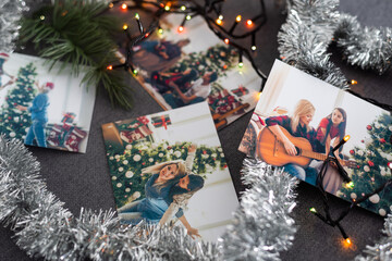 Wall Mural - Photos of family against Christmas lights decor background