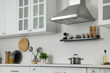 Sticker - Elegant kitchen interior with range hood and furniture