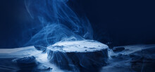 Mystical Rocks In Smoke On A Dark Background. Panoramic View Of The Abstract Fog. Beautiful Swirling Blue Smoke. Mockup For Your Logo. Wide Angle Horizontal Wallpaper Or Web Banner.