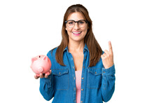 Middle Age Caucasian Woman Holding A Piggybank Over Isolated Background Pointing Up A Great Idea
