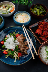 Poster - Asian lunch duck fillet salad, sweet and sour chicken, chicken noodle soup with mushrooms, beans, rice.