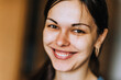 © shchus - The face of a close-up of a beautiful, smiling woman, a brown-eyed brunette girl of Ukrainian, Tatar nationality. Photography, portrait.