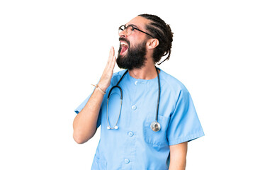 Wall Mural - Young doctor man over isolated chroma key background yawning and covering wide open mouth with hand