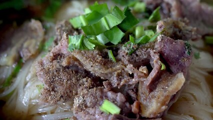 Wall Mural - Asian delicatessen, beef noodles with soup.