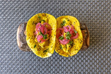 Poster - Two Mexican tacos with meat and vegetables in yellow corn tortilla with exclusive decoration