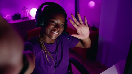 Poster - African american woman streamer having video call at gaming room