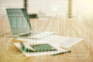 Poster - Multi exposure of creative statistics data hologram on blurry calculator with laptop background, stats and analytics concept