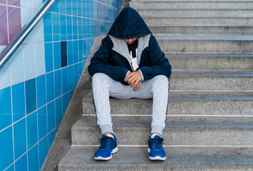 Portrait of Sportive Caucasian male boy Posing in the street