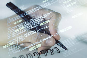 Fototapete - Multi exposure of abstract software development hologram and man hand writing in notebook on background, research and analytics concept