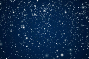 Winter holidays and wintertime background, white snow falling on dark blue backdrop, snowflakes bokeh and snowfall particles as abstract snowing scene for Christmas and snowy holiday design, copyspace