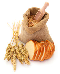 Canvas Print - Wheat in a sack, ears and bread.