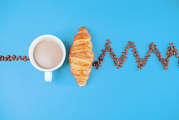 Wall Mural - Cups of fresh hot coffee on a blue background