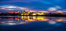 Panoramic Evening View Of Mantua, Lombardy, Italy; Scenic Twilight Skyline View Of The Medieval Town Reflected In The Lake Waters