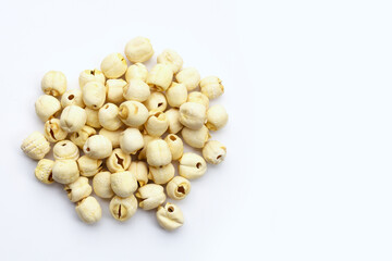 Dried lotus seeds on white background.