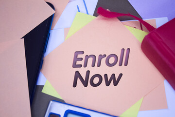 Poster - Enroll Now. Text on adhesive note paper. Event, celebration reminder message.