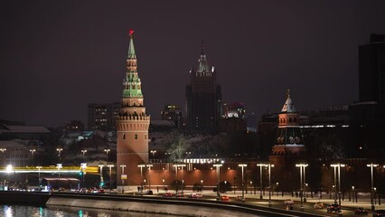 Wall Mural - Winter night footage in Moscow, Russia. Zoom in view of landmarks of the city. Moving traffic at night