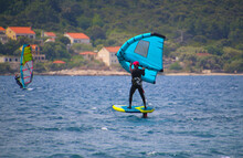 Windsurfing With Wing And Foilboard  At The Adriatic Sea Between Islands Peljesac And Korcula, Croatia
