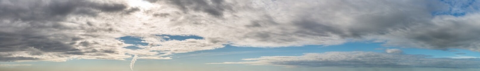 Wall Mural - fantastic soft thunderclouds, sky panorama