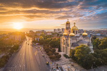 The Cathedral Of The Assumption In Varna, Bulgaria. Aerial Sunset Cityscape View