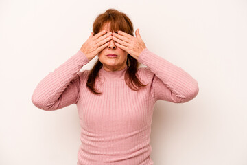 Wall Mural - Middle age caucasian woman isolated on white background afraid covering eyes with hands.