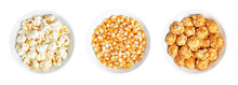 Popcorn, Unpopped, Popped And Caramel Coated, In White Bowls. Butterfly Shaped Popcorn, Puffed Up From Heated Kernels, Orange Corn Seeds, And Mushroom Shaped Popped Corn With Thin Caramel Candy Shell.