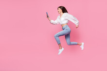 Full Length Photo Of Positive Lady Denim Stylish Outfit Hurry Up Discount Device Gadget Shop Empty Space Isolated Pink Color Background