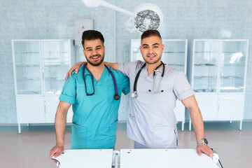 Wall Mural - Group of medical staff smiling at the hospital.