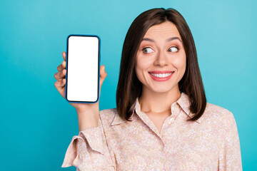 Wall Mural - Close up photo of funny positive lady stylish wear interested look telephone demonstrate display menu isolated on cyan color background