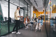 © BullRun - Group of diverse team members attending training at office