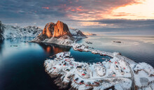 Landscape Of Aerial View Of Snowy Mountain And Fishing Village On Coastline In Winter At Lofoten Islands