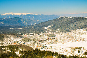 Wall Mural - Aerial view of Bakuriani village, winter resort in Georgia. Scenic panorama from top ski resort viewpoint