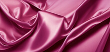 Pink Silk Satin Fabric Background. Wavy Soft Folds Of Pink Fabric. Shiny Fabric Surface.