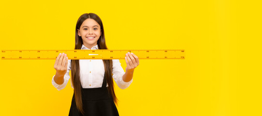 Sticker - smiling teen girl hold ruler. back to school. algebra and geometry. kid study math. Banner of school girl student. Schoolgirl pupil portrait with copy space.