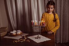 Family Celebration Of The Jewish Holiday Hanukkah  At Home