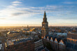 canvas print picture - The sun setting over the historical city centre of Groningen on a beautiful afternoon.