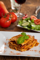 Wall Mural - lasagna on a white plate