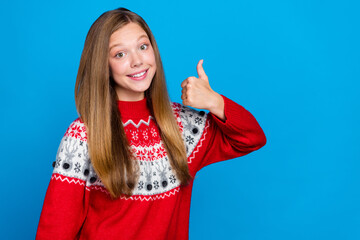 Poster - Photo of cheerful optimistic girl with straight hairstyle dressed red pullover showing like thumb up isolated on blue color background