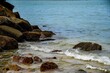 Beautiful shot of rocks on the coast of the sea