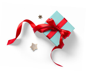 Wall Mural - isolated christmas gift box with a red bow and christmas decoration on a white background; design el