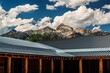 Grand Teton National Park landscape with metal roof buildings in the foreground in Wyoming