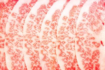 Wall Mural - Close up shot Rare Sliced Wagyu beef with marbled texture, Marbled meat texture of Beef Marbling.