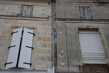 Wall Mural - before and after facelift stones comparison of clean building facade difference wash cleaning