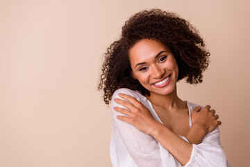 Poster - Portrait of elegant gracious person hands embrace shoulders toothy smile isolated on beige color background