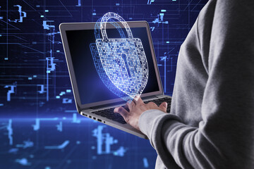 Aufkleber - Close up of hacker hands using laptop with creative glowing digital padlock hologram on blurry dark background. Secure, hacking, safety and protection concept.