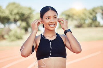 Sticker - Fitness, exercise and black woman listening to music with earphones for running motivation while outdoor at stadium for marathon or race training. Smile of athlete happy before exercise or run