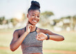© L Ismail/peopleimages.com - Fitness, exercise and black woman check pulse after running, athletics and workout in sports stadium. Health, wellness and portrait of female athlete monitor heart rate with hand on neck in training