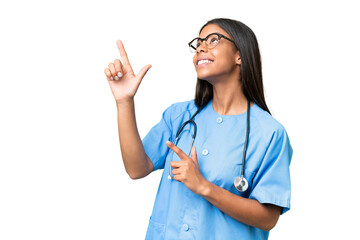 Young African american nurse woman over isolated background pointing with the index finger a great idea